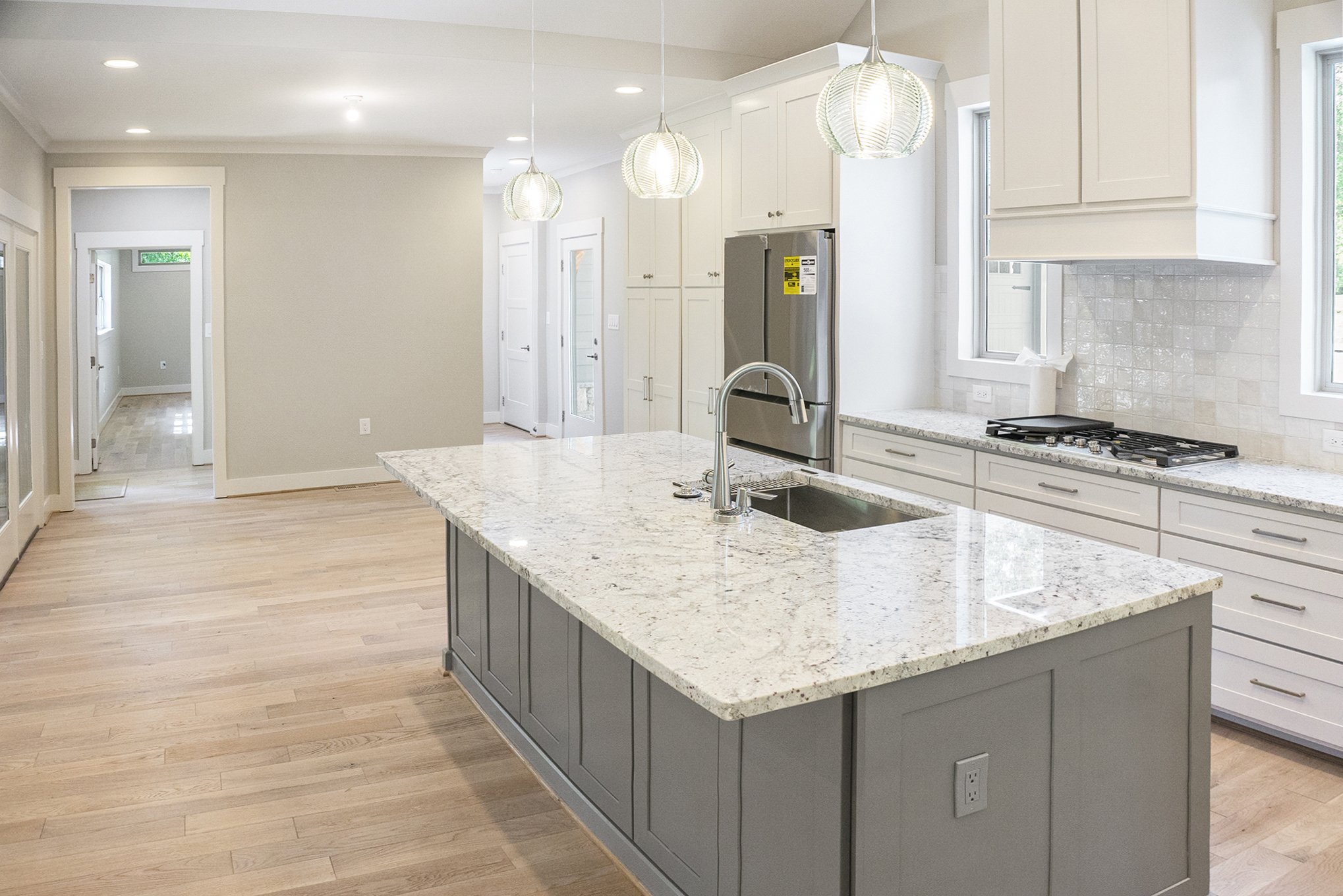 a kitchen with a large island