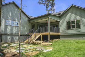 a house with a deck and a porch